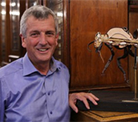 Dr William Foster in the Museum of Zoology