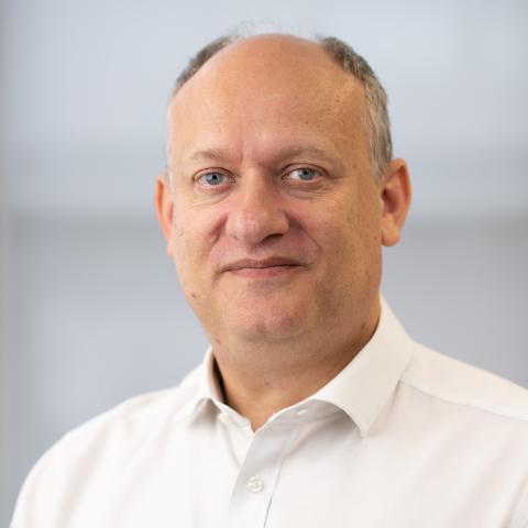 portrait image of adam fox OBE