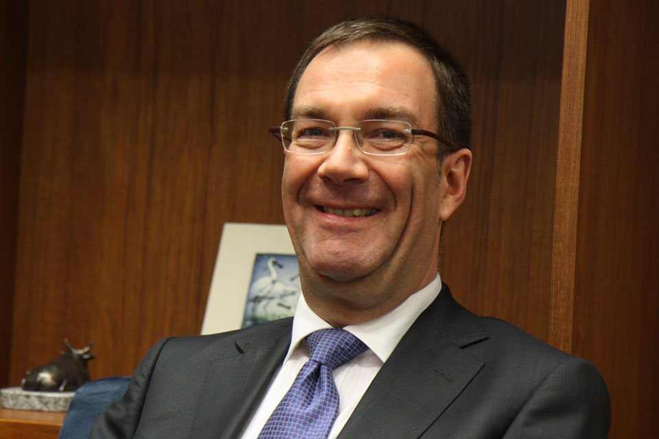 Portrait photograph of Chris Wood CMG