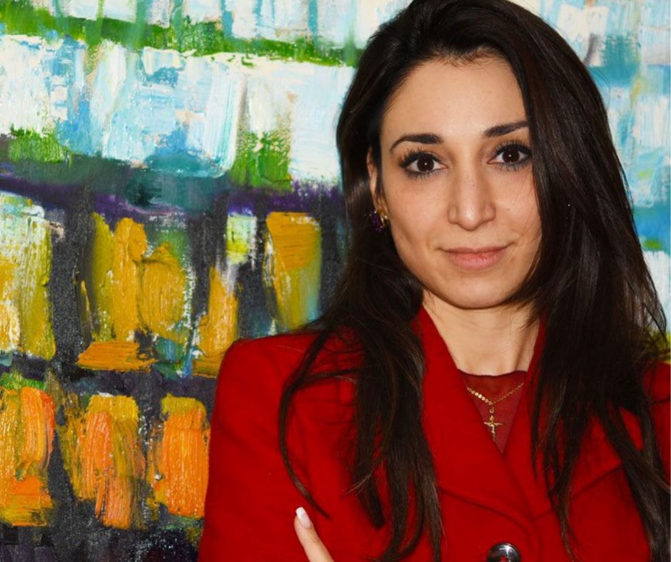 heba bevan against a colourful background