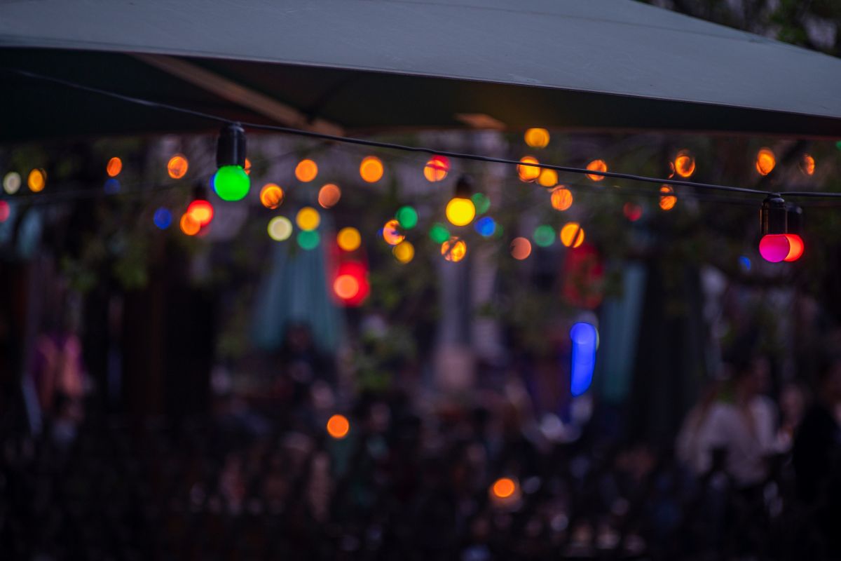 Multicoloured lights shine in the night sky