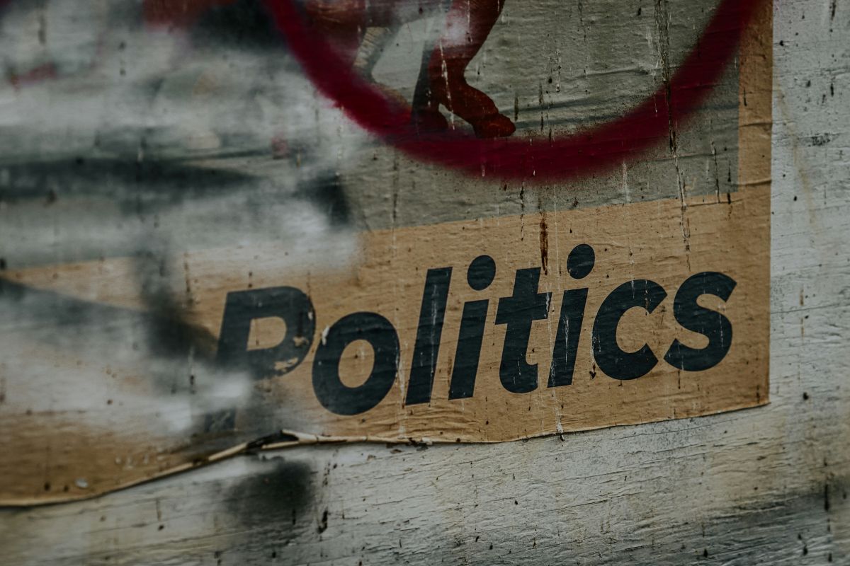 The word 'Politics' printed on a wall