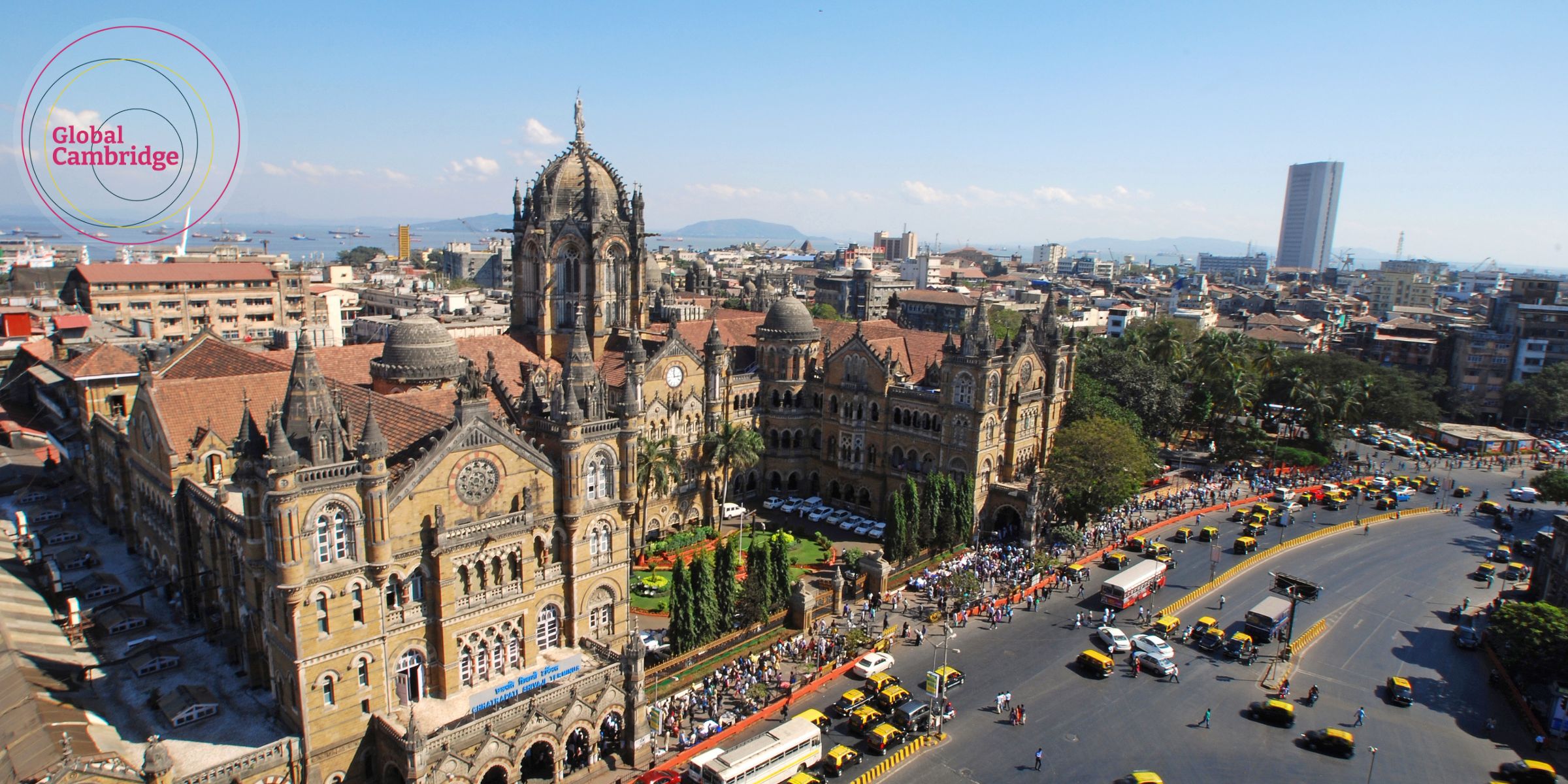 Photo of Mumbai railway station with Global Cambridge logo