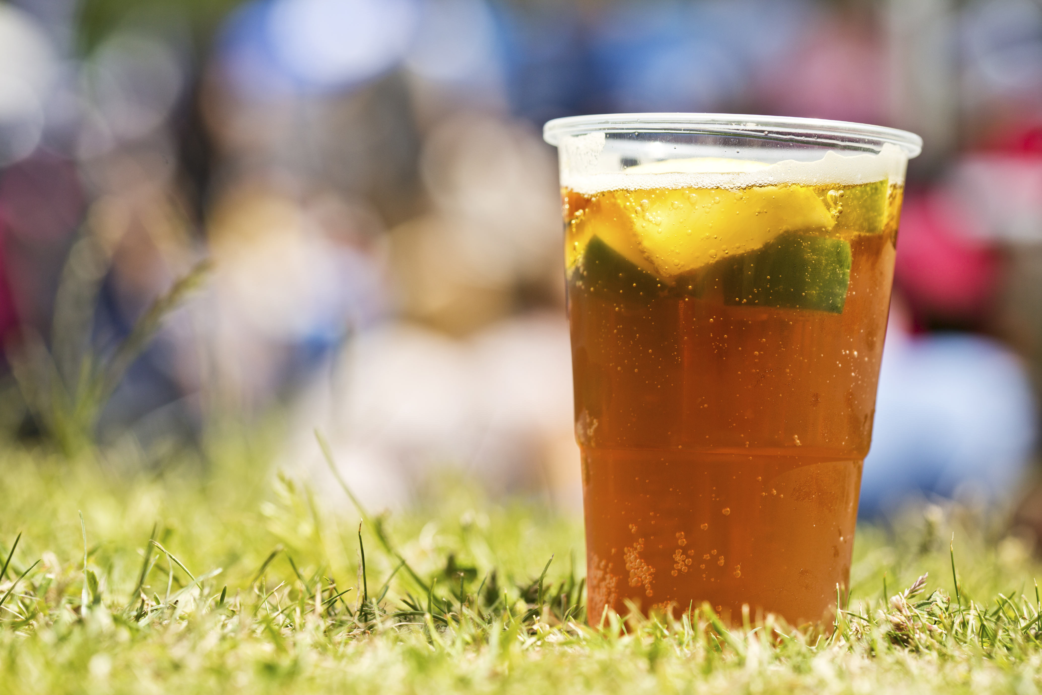 Glass of Pimms sat on the lawn