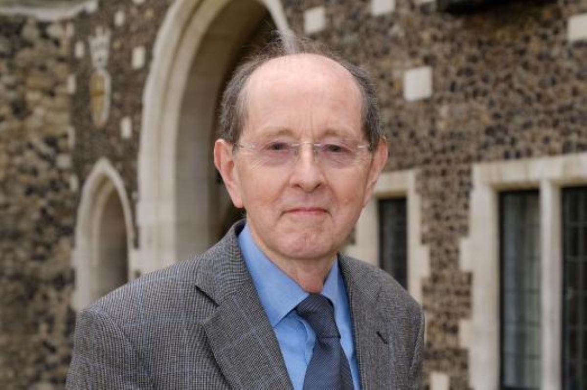 Photo of Sir Paul Britton outside a church