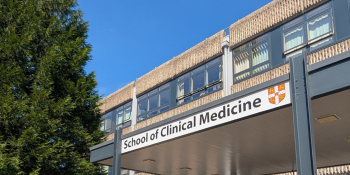 The front of the School of Clinical Medicine building on a sunny day.