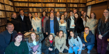 Group of alumni at the library