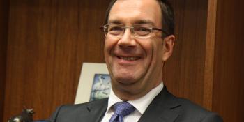 Portrait photograph of Chris Wood CMG
