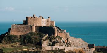 View of Gorey Castle with blue sea in the background