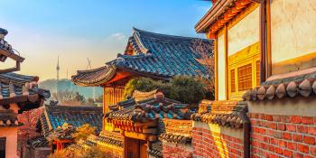 View of Bukchon Hanok village with the sun setting