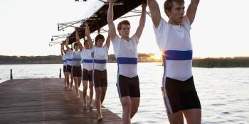 Rowers carrying their boat
