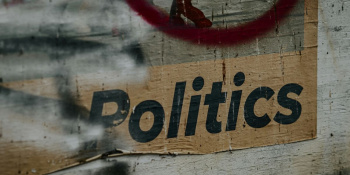The word 'Politics' printed on a wall