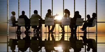 A meeting held in a office