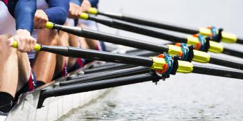 A team of rowers on a river