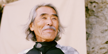 Kayak guide Shokita Masakatsu (73) photographed on a beach near his home. His philosophy is to share the joy of sea kayaking and