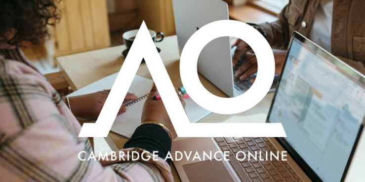 Advance Online logo super imposed over close up of two people working at a desk