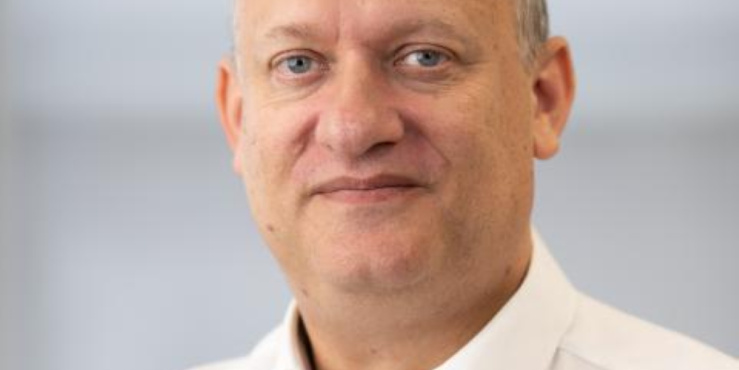 portrait image of adam fox OBE