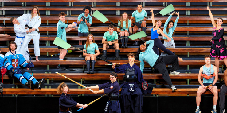CAM 107 cover photograph showing the range of sports people from across the University of Cambridge sat on benches in a sports h