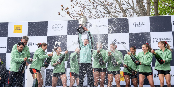 Blue Boat crews celebrate on the podium after winning The Boat Race 2025