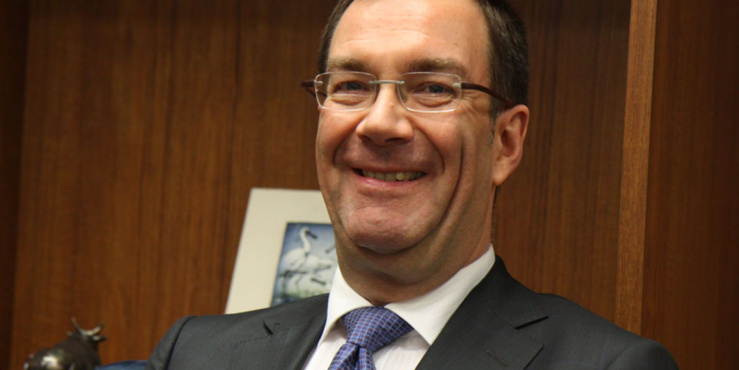 Portrait photograph of Chris Wood CMG