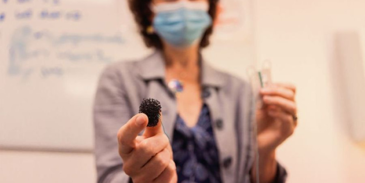 Rebecca Fitzgerald with cancer-testing device