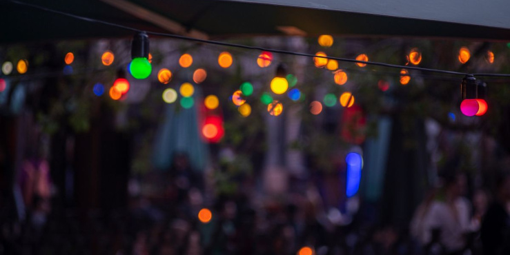 Multicoloured lights shine in the night sky