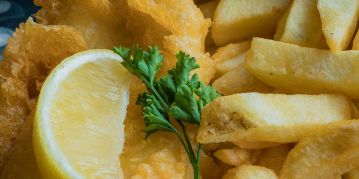 Battered fish with chips on a plate