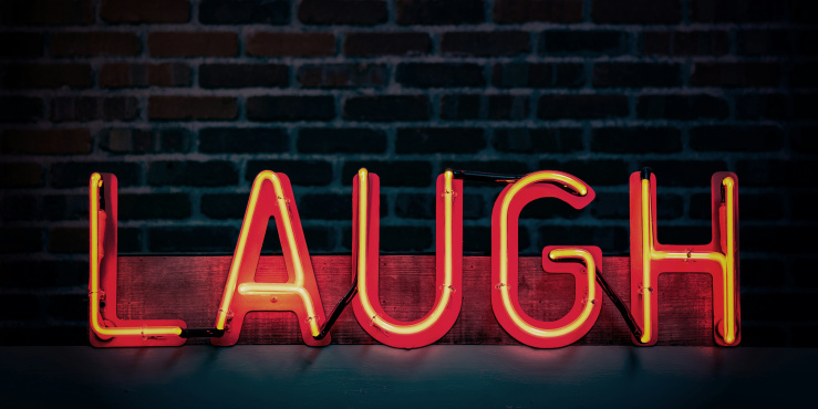 Laugh neon sign