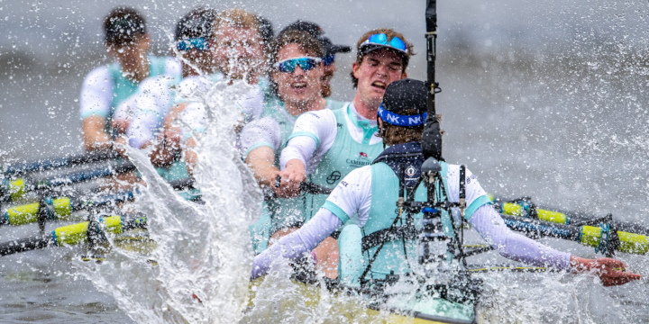 The men's Blue Boat in action on the river,