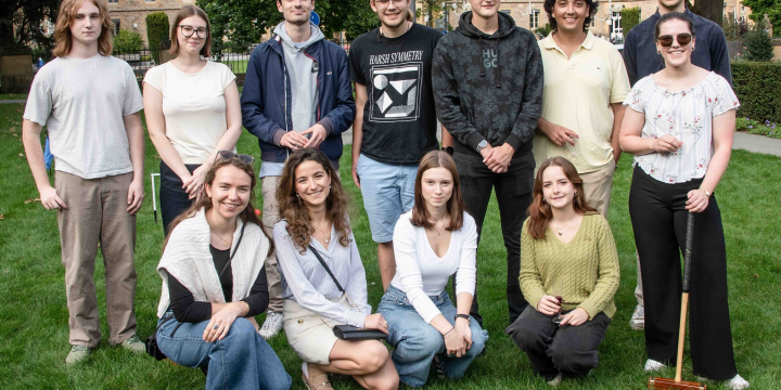 Group of people posing with croquet mallets