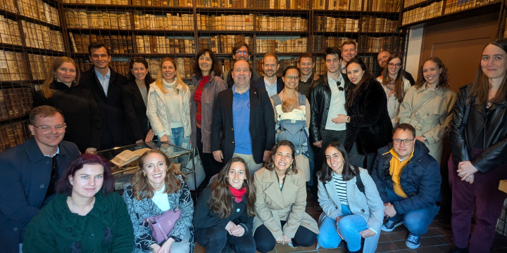 Group of alumni at the library