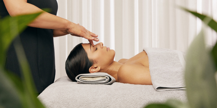 Women getting a head massage at the hotels spa