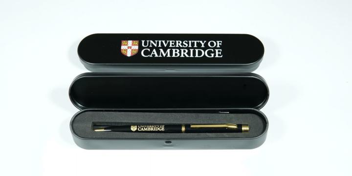 Black box with University branded with a black pen