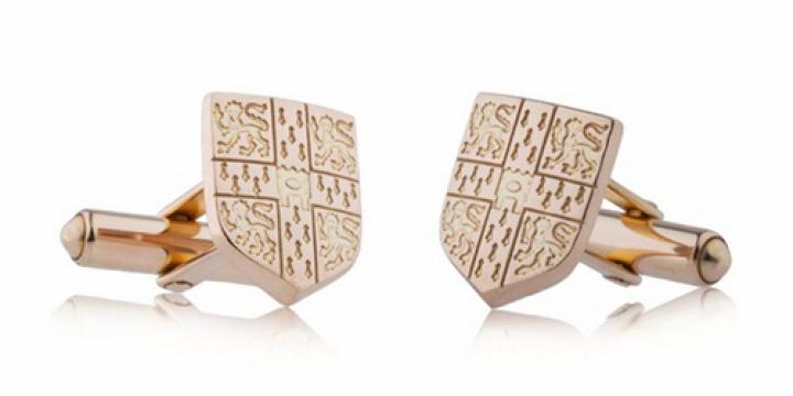 University gold cufflinks