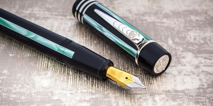 Blue pinstripe and silver pen