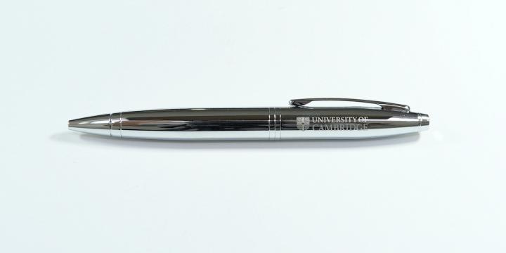 Silver pen with University branding engraved
