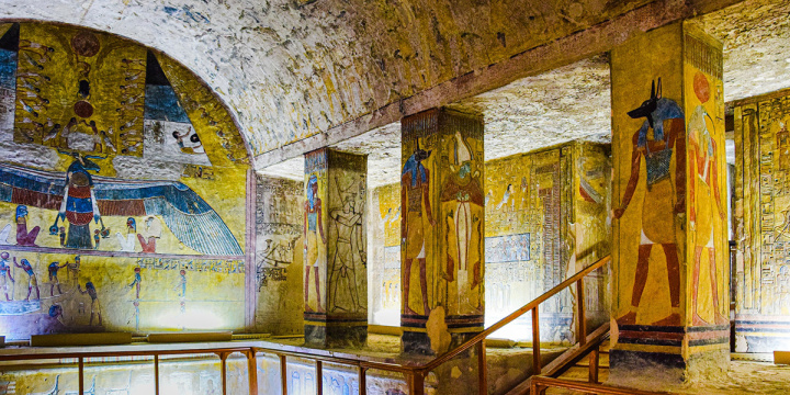 Egyptian tomb with colourful artwork covering the walls