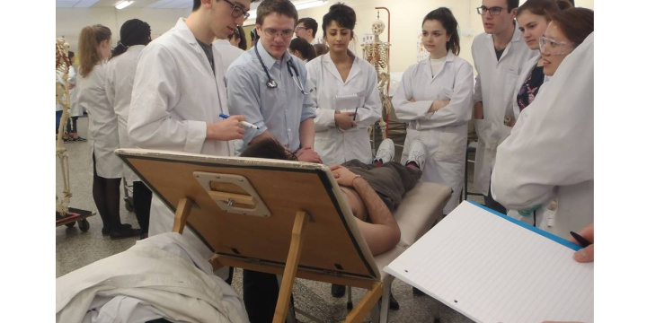Pre-clinical students gather for a teaching session. Image Credit: Cecilia Brassett.