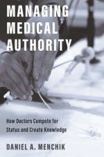 Front cover showing hands touching a medical tube in black and white