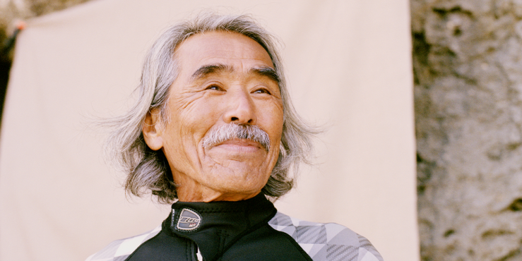 Kayak guide Shokita Masakatsu (73) photographed on a beach near his home. His philosophy is to share the joy of sea kayaking and