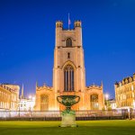 Night looking across Senate House Lawn towards Great St Mary's, the University Church