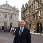 Sam Sudar in front of the Senate House