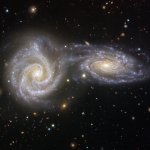 image of two spiral galaxies