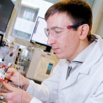 Sam Cobb portrait in lab