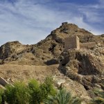Watchtowers and defending walls and mountains in Old Muscat, Oman