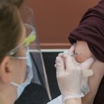 Patient receiving a COVID-19 vaccination