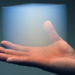 A block of silica aerogel being held in a person's hand