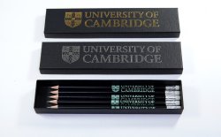 Black lids with university logo and a black box containing University branded black pencils