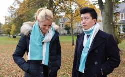 Alumni modelling the scarf with fleece