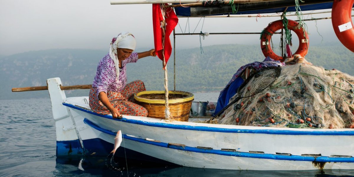 Fisherwoman at sea
